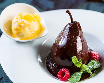 Poached Pears in a Chocolate and Coconut Sauce